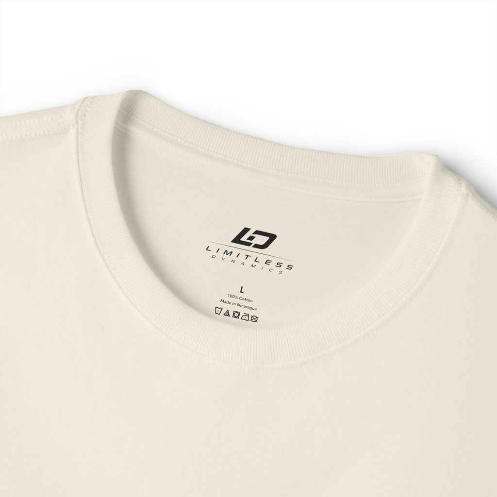 Cream tee collar detail with Limitless Dynamics label